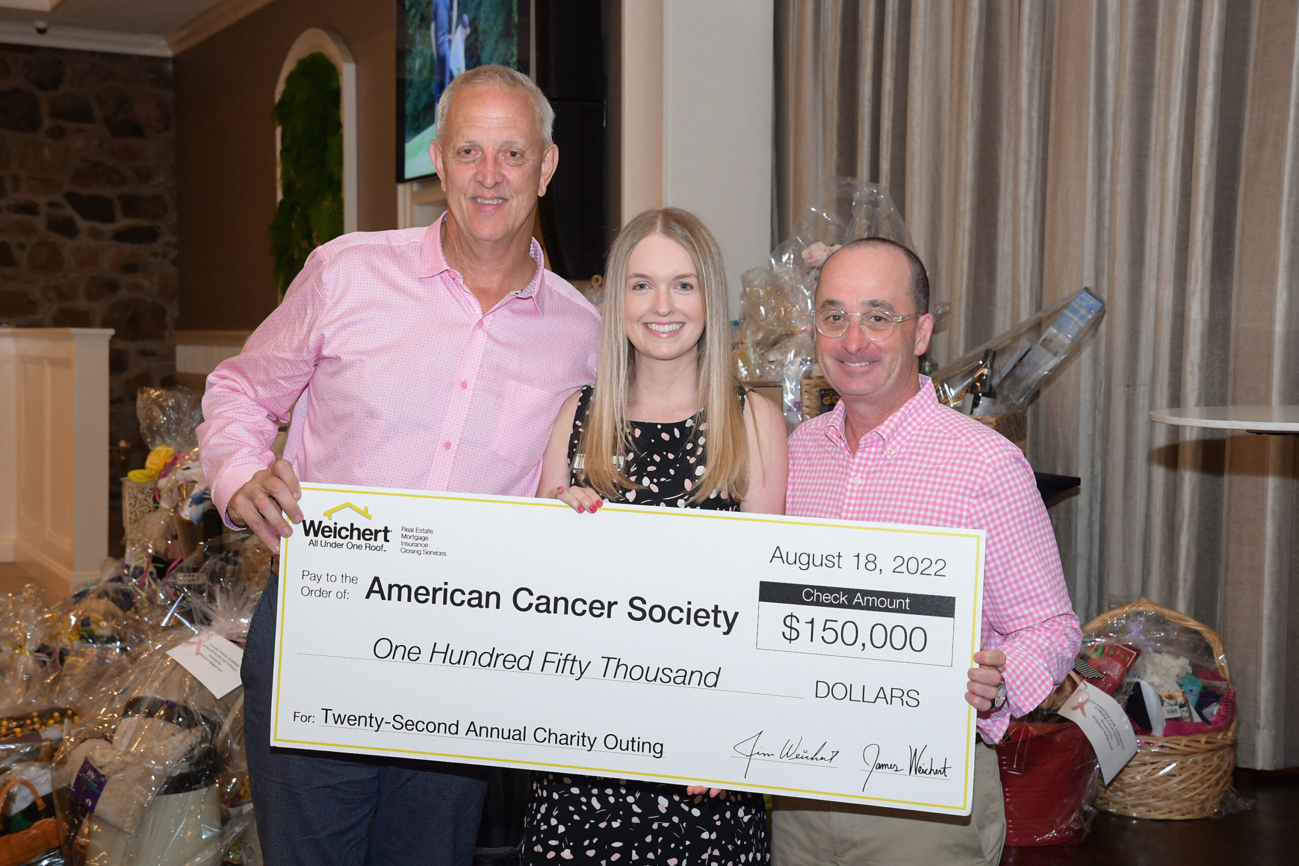 (Left) John Mahoney, president of Weichert Insurance Agency, and (right) Joe McDonald, regional vice president of Weichert, Realtors and chairperson of Weichert’s 22nd Annual Charity Outing, present a check for $150,000 to Katelyn French, senior corporate relations manager for the American Cancer Society.
